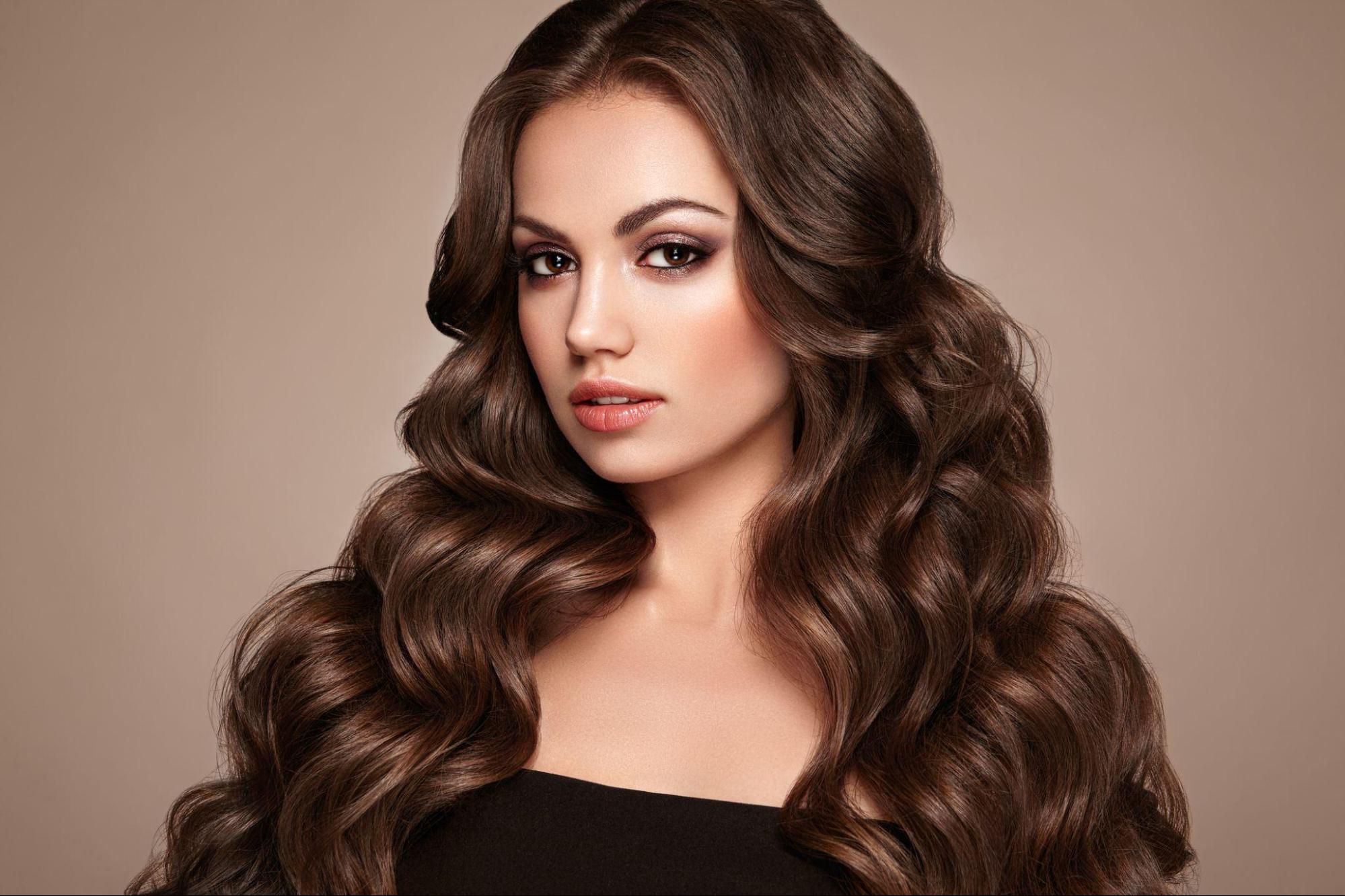Caucasian woman with long, thick and healthy hair.